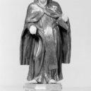 Jan Kapistrán - Sv. Jan Kapistrán – s křížem na prsou a ukazuje na krucifix (chybí na soše) -common.wikimedia