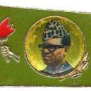 Mobutu - Odznak strany MPR zobrazující Mobutu Sese Seko. -wikimedia.commons –