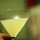 Kartuziáni a chartreuska - A cocktail glass with the Last Word raised to the light. (2009) -wikimedia.commons –